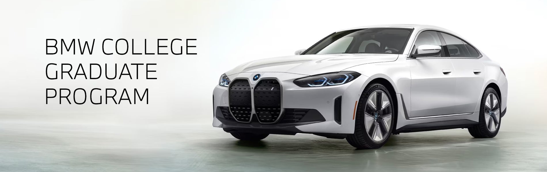 White BMW i4 parked. BMW College Graduate Program. | BMW Showcase 4 in Derwood MD