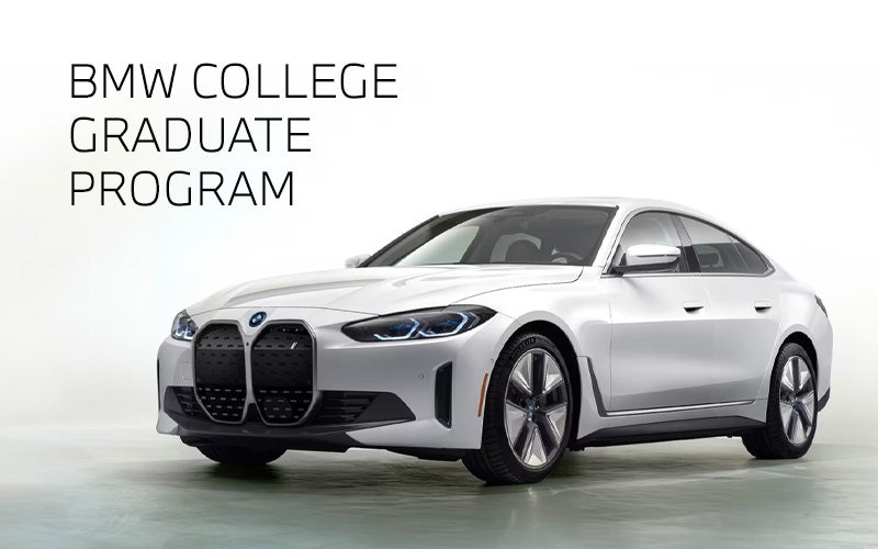 White BMW i4 parked. BMW College Graduate Program. | BMW Showcase 4 in Derwood MD